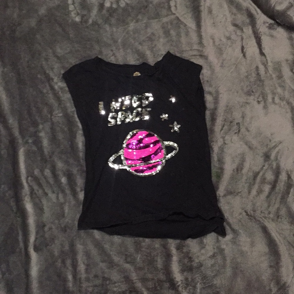 A black and pink space shirt